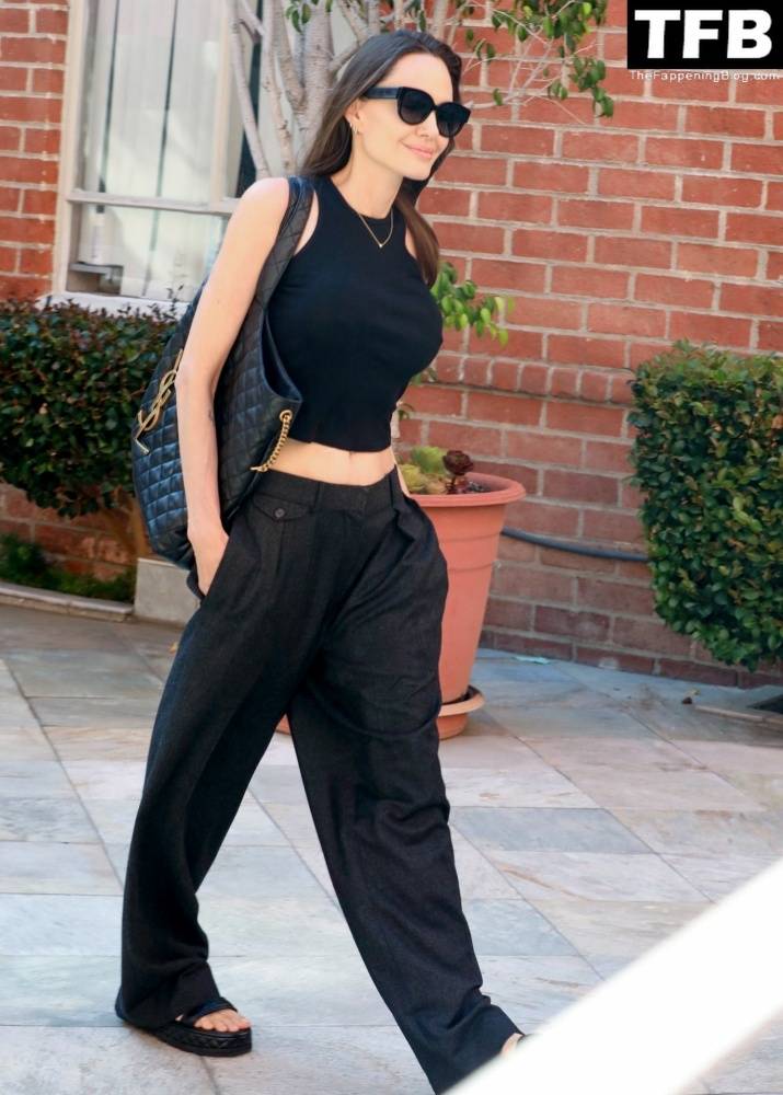 Angelina Jolie Shows Off Her Tight Tummy Leaving an Office Building - #6