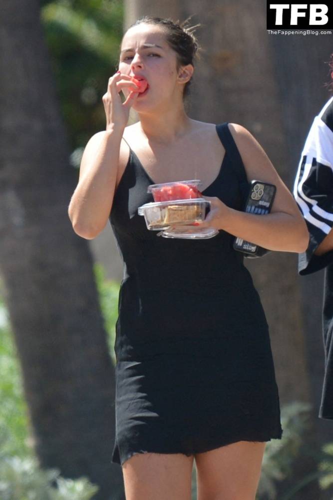 Addison Rae Indulges in Some Refreshing Watermelon While Out in a Tight Skirt with Her Boyfriend - #main