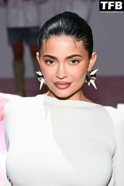 Kylie Jenner Flaunts Her Curves in a White Dress During Paris Fashion Week on modelfansclub.com