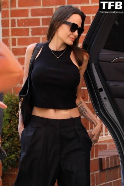 Angelina Jolie Shows Off Her Tight Tummy Leaving an Office Building on modelfansclub.com