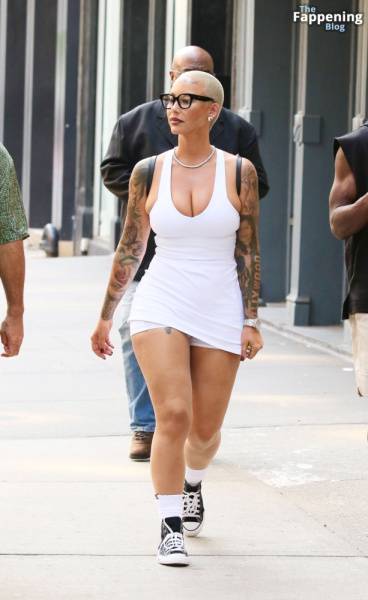 Amber Rose Turns Heads in a Revealing White Mini Dress During SoHo Outing (39 Photos) on modelfansclub.com